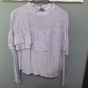 Blue and white stripe long sleeve top with elastic cinching at wrist